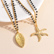 Ocean Muse – Titanium Steel Double Layer Leaf & Starfish Necklace
