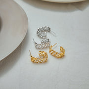 Forme Pure — Geometric Silhouette Stud Earrings