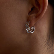 Forme Pure — Geometric Silhouette Stud Earrings